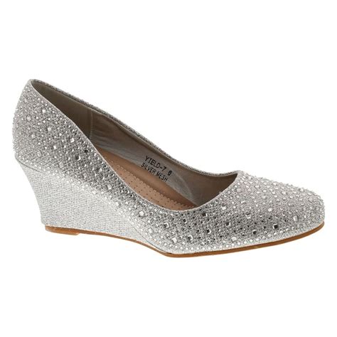 silver closed toe wedge heels.